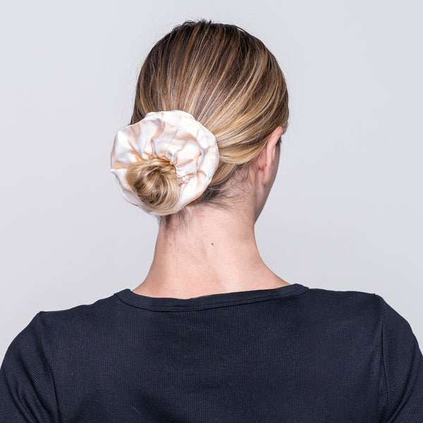 Pet accessories | Scrunchie | Dogily Woman using Dogily Serene Scrunchie in Beige Stripes on a hair bun